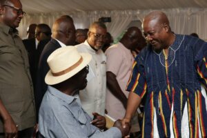 John Agyekum Kufuor, former President of the Republic of Ghana (2001–2009), and John Dramani Mahama, current President of the Republic of Ghana.